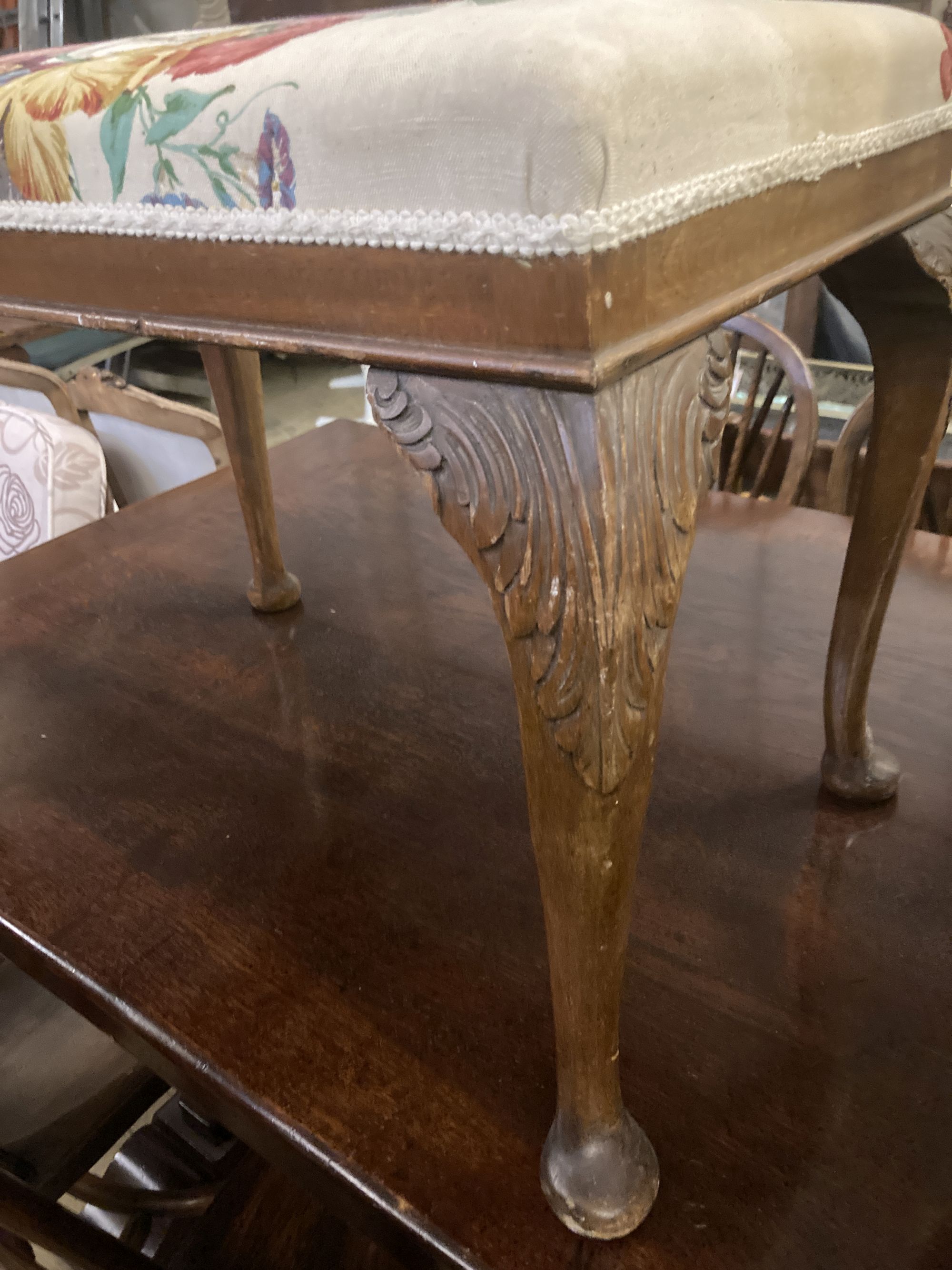 A late Victorian upholstered tub framed elbow chair, together a Queen Anne style dressing stool